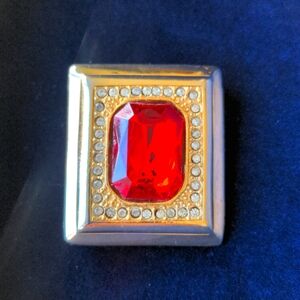 Vintage gold tone statement brooch pin with large emerald cut ruby red stone